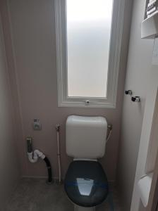 A bathroom at Mobilhome grand standing 2 Ch 2 Sde 2 WC