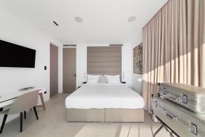 Voodi või voodid majutusasutuse LIOQA Resort toas