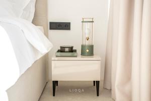 Voodi või voodid majutusasutuse LIOQA Resort toas
