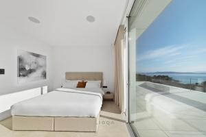 Voodi või voodid majutusasutuse LIOQA Resort toas