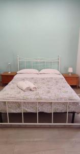 Кровать или кровати в номере Casa Napoli Centro Carmen e Sara