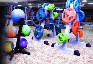 a room with a bunch of colorful exercise equipment at Javson Airport Hotel in Sialkot