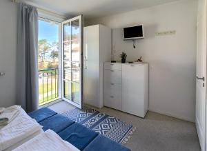 Foto dalla galleria di Haus Meeresblick - Ferienwohnung Strandloeper C 2.02 (Ref. 134796) a Baabe Altre 9 foto