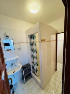 Kuchyň nebo kuchyňský kout v ubytování Apartmány Srub Jenišov