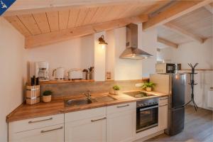Küche/Küchenzeile in der Unterkunft Ferienhaus Becker Ferienwohnung Brücke