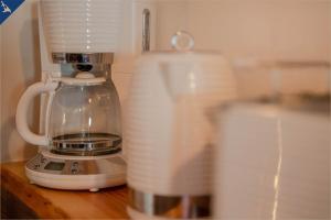 Kaffee-/Teezubehör in der Unterkunft Ferienhaus Becker Ferienwohnung Brücke