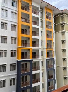 a tall apartment building with balconies on it at Bayou Bliss@Bayou Lagoon in Ayer Keroh