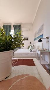 A bed or beds in a room at Vesuvio Apartment