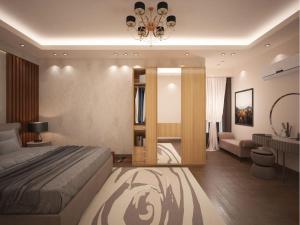 亞歷山大的住宿－مراحب للاسكان الفندقي - منتجع سيسيليا / Maraheb Group For Hotel Accommodation - Cecelia Resort，一间卧室设有一张床和一间客厅。