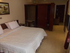 Voodi või voodid majutusasutuse Conference Hotel & Suites Ijebu toas
