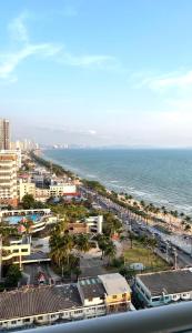 an aerial view of a city and the ocean at View Talay Condominium by Vlad Property in Pattaya South