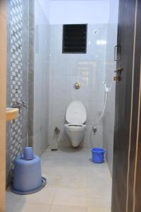 Baðherbergi á Hotel Sai Nanda