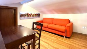 Area soggiorno di Int 18 - Suite Lorenzo by Residence San Luca