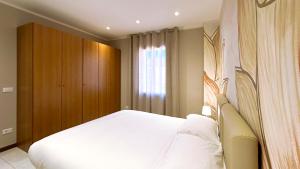 Letto o letti in una camera di Int 18 - Suite Lorenzo by Residence San Luca