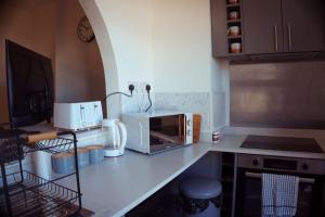Kjøkken eller kjøkkenkrok på Perfect Stays in Mutely for Couples
