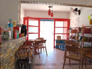 A restaurant or other place to eat at Anglo Chalets - Ageeba beach