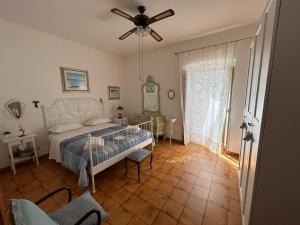 Ένα ή περισσότερα κρεβάτια σε δωμάτιο στο Casa del 1° Mulino