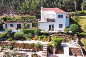 an aerial view of a house with a garden at Casa Estrela in Alvaiázere