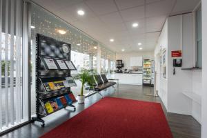 Fitness centrum a/nebo fitness zařízení v ubytování Los Lorentes Hotel Bern Airport