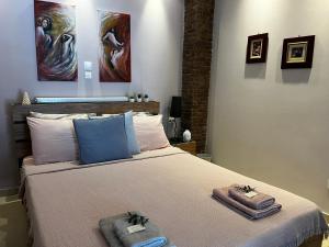 Posteľ alebo postele v izbe v ubytovaní Electra Garden House