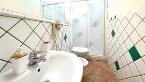 Bilik mandi di Int 4 - Suite Edoardo by Residence San Luca