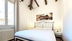Katil atau katil-katil dalam bilik di Int 4 - Suite Edoardo by Residence San Luca