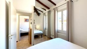 Katil atau katil-katil dalam bilik di Int 4 - Suite Edoardo by Residence San Luca