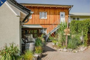 Ein Garten an der Unterkunft Ferienhaus Becker Ferienwohnung Brücke