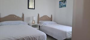 Posteľ alebo postele v izbe v ubytovaní Torrox Costa ZJ Apartment