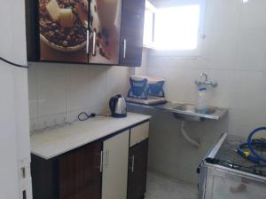 A kitchen or kitchenette at Anglo Chalets - Ageeba beach