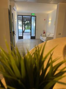 Postel nebo postele na pokoji v ubytování Hotel l'Etrusco - San Vincenzo
