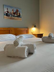 Postel nebo postele na pokoji v ubytování Hotel l'Etrusco - San Vincenzo