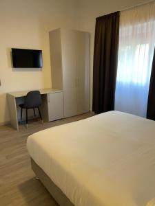 TV a/nebo společenská místnost v ubytování Hotel l'Etrusco - San Vincenzo