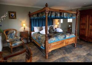 Ένα ή περισσότερα κρεβάτια σε δωμάτιο στο Burtree Country House and Retreat