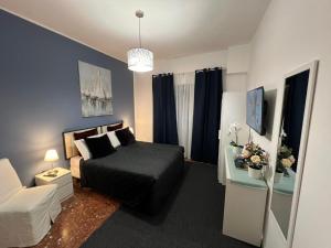 Postel nebo postele na pokoji v ubytování affittacamere appia nuova 639