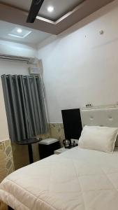 Кровать или кровати в номере Lazy staytion