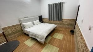 Кровать или кровати в номере Lazy staytion