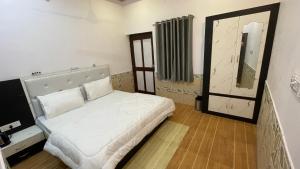 Кровать или кровати в номере Lazy staytion