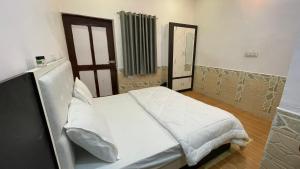 Кровать или кровати в номере Lazy staytion