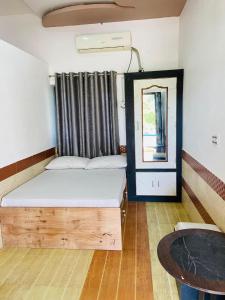Кровать или кровати в номере Lazy staytion