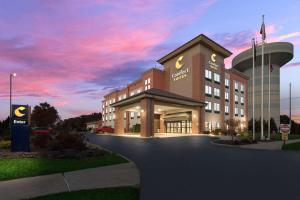 a rendering of the front of a hotel at Comfort Suites Columbus East Broad in Columbus