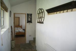 Postel nebo postele na pokoji v ubytování Cashel 129 Prestons Cottage