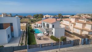 arial view of a house with a swimming pool at Llucmajor -1630-21 Mallorca in Llucmajor