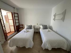 Posteľ alebo postele v izbe v ubytovaní Estepona - Playa - Villa en urbanización privada cerca del mar Da5
