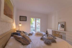 En eller flere senge i et værelse på Playa de muro -2193-85 Mallorca