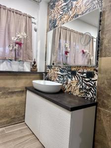 Et badeværelse på Vacabruz Apartment