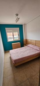 Postel nebo postele na pokoji v ubytování Apartamento 2ª Línea-Oropesa del Mar