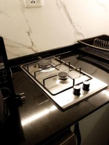 a stove top oven sitting on top of a counter at privet (35)near downtown JRE in Amman