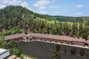 an overhead view of a large building with a mountain at Deadwood Gulch Resort, Trademark Collection by Wyndham in Deadwood