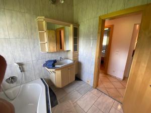 Koupelna v ubytování Ferienwohnung Mark-Oehmen + 17 fotografií